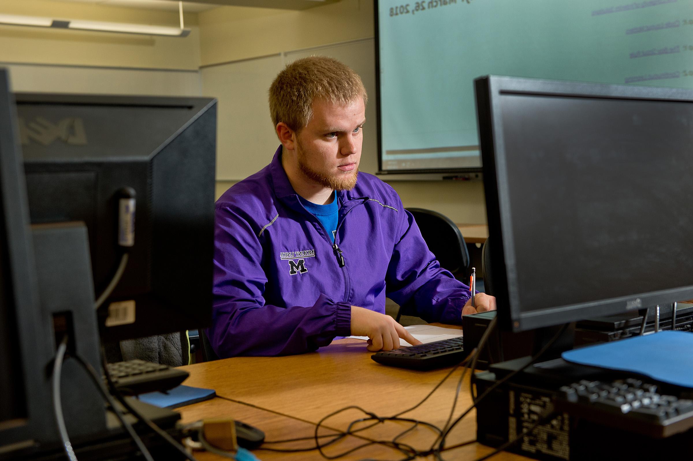 student on computer